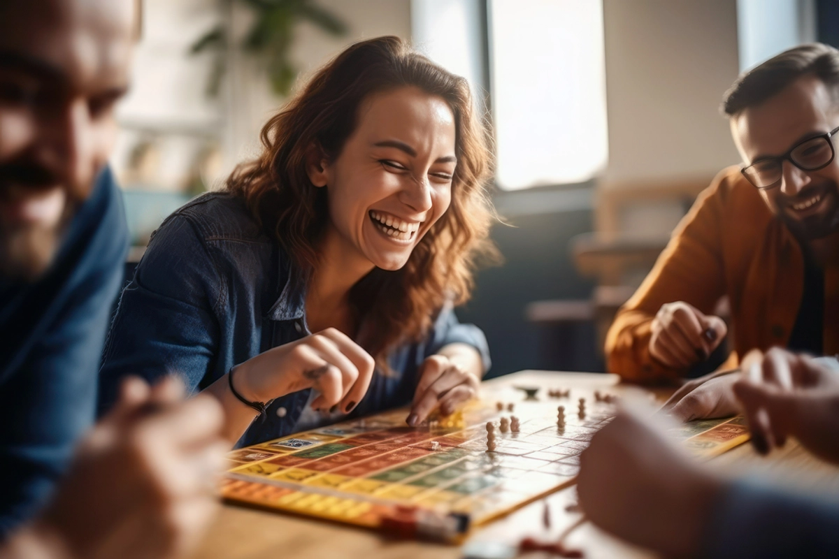 Friends playing board games - all happy